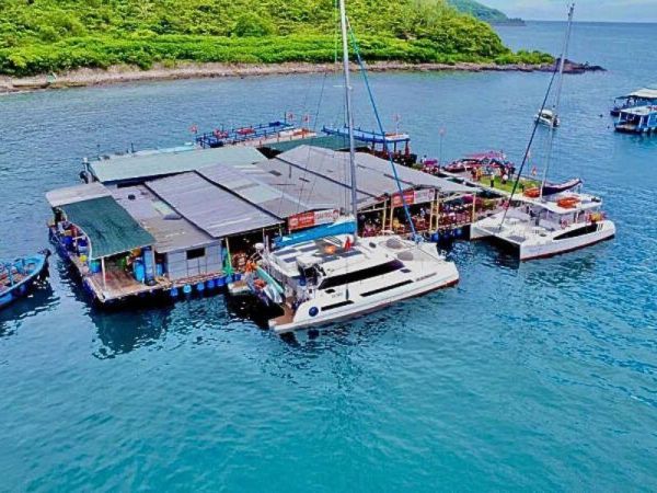 Try fresh seafood at a floating village